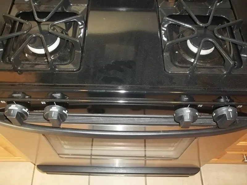 A gas range checked during a home inspection