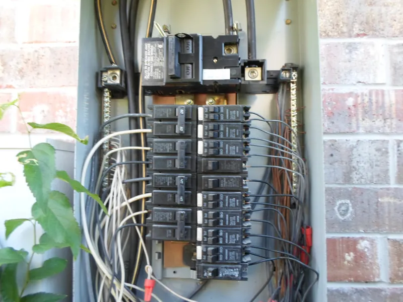 An electrical service panel opened up for inspection